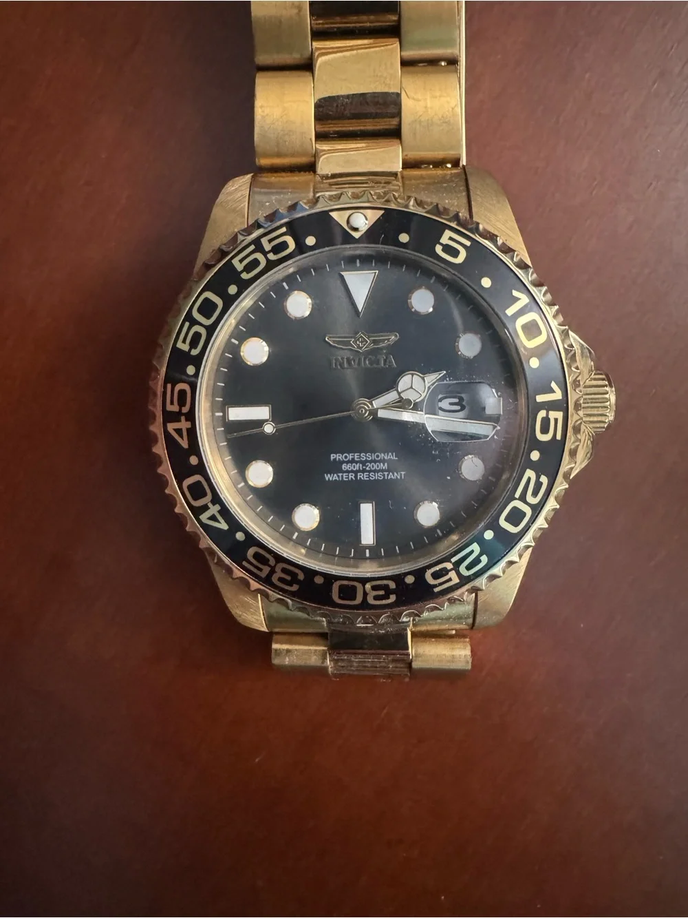 Invicta Gold Tone Men's Watch with Black Dial and Bezel